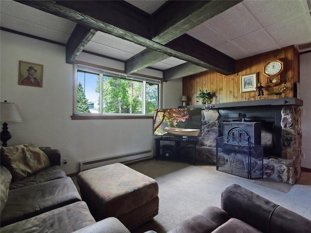 1346 Rainbow Dr, Silverthorne, CO 80498 - living area with baseboard heating, wooden walls, carpet, and beamed ceiling