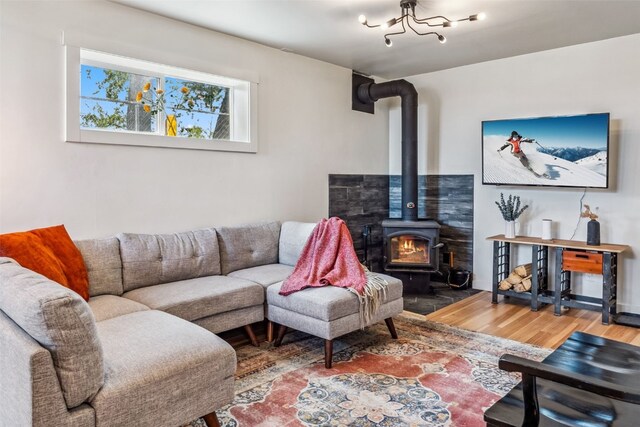 530 Castello Ave, Fairplay, CO 80440 - living area featuring a wood stove and wood finished floors