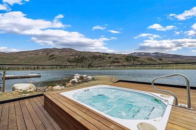 11 Glazer Trl, Silverthorne, CO 80498 - view of pool with hot tub deck surround and a deck with water view