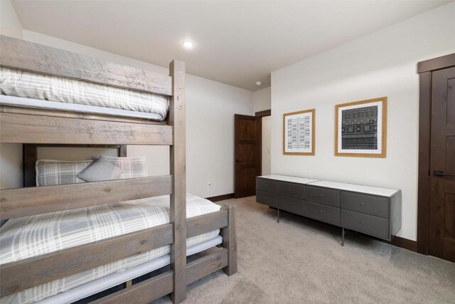 11 Glazer Trl, Silverthorne, CO 80498 - bedroom with baseboards and light carpet