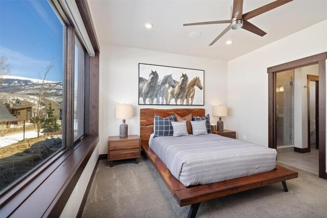 11 Glazer Trl, Silverthorne, CO 80498 - bedroom with light colored carpet, recessed lighting, ensuite bath, and multiple windows