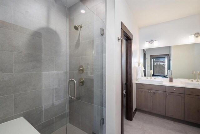 11 Glazer Trl, Silverthorne, CO 80498 - full bathroom featuring double vanity, a shower stall, and a sink
