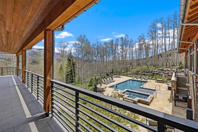 11 Glazer Trl, Silverthorne, CO 80498 - balcony with a patio area and a community hot tub