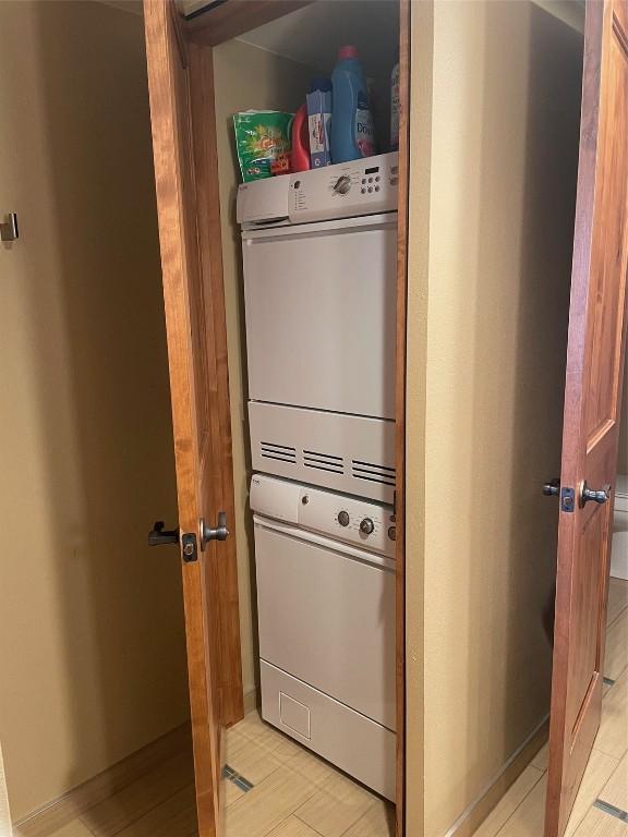 1945 Cornice Rd Unit 304 2334, Steamboat Springs, CO 80487 - washroom with stacked washer and clothes dryer