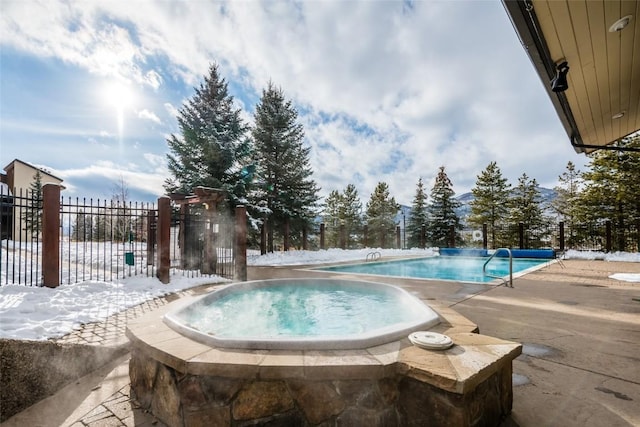 1945 Cornice Rd Unit 304 2334, Steamboat Springs, CO 80487 - pool with a patio area, a community hot tub, and fence