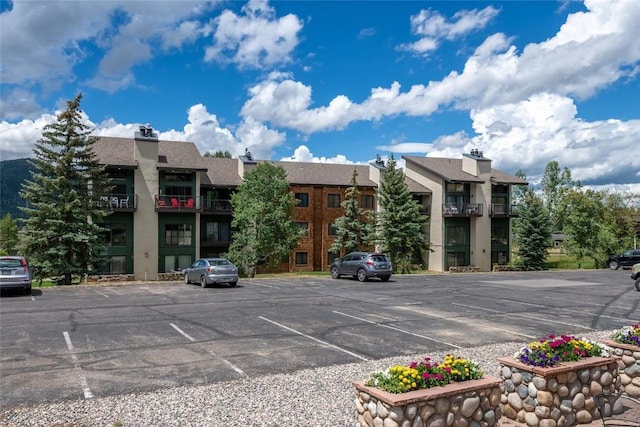 1945 Cornice Rd Unit 304 2334, Steamboat Springs, CO 80487 - view of property featuring uncovered parking