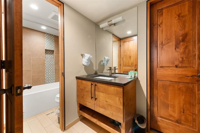 1945 Cornice Rd Unit 304 2334, Steamboat Springs, CO 80487 - full bathroom with toilet, tile patterned floors, a bath, vanity, and recessed lighting