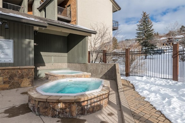 1945 Cornice Rd Unit 304 2334, Steamboat Springs, CO 80487 - snow covered pool with an in ground hot tub and fence