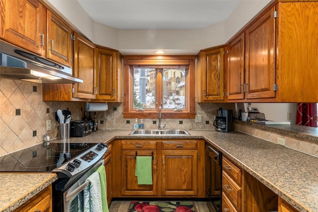 kitchen featuring a sink, electric range, black dishwasher, brown cabinetry, and under cabinet range hood