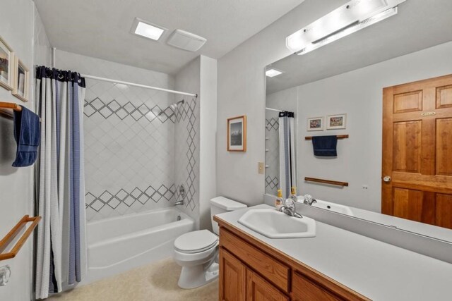 34995 Country Green Rd, Steamboat Springs, CO 80487 - full bath with toilet, vanity, and shower / bathtub combination with curtain