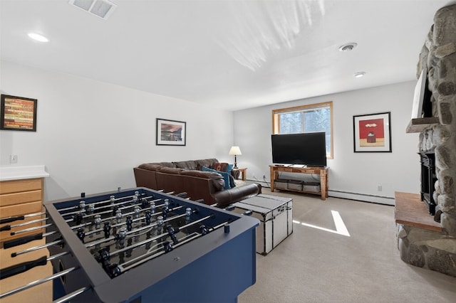 773 Range Rd, Breckenridge, CO 80424 - recreation room with a stone fireplace, light carpet, recessed lighting, and baseboard heating