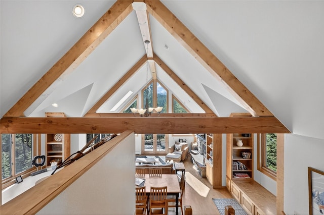 773 Range Rd, Breckenridge, CO 80424 - hallway with beam ceiling, healthy amount of natural light, wood finished floors, and high vaulted ceiling