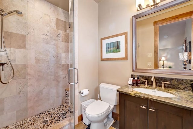 2542 Ski Trail Ln, Steamboat Springs, CO 80487 - bathroom with toilet, a shower stall, and vanity
