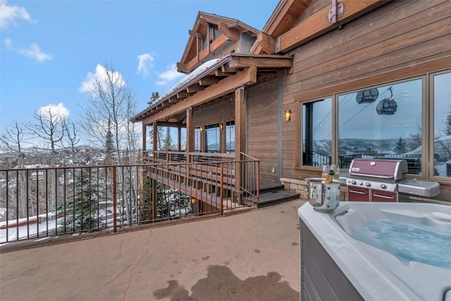 2542 Ski Trail Ln, Steamboat Springs, CO 80487 - view of home's exterior with a hot tub