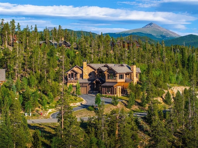 455 Highfield Trl, Breckenridge, CO 80424 - aerial view of property and surrounding area with a forest and mountains