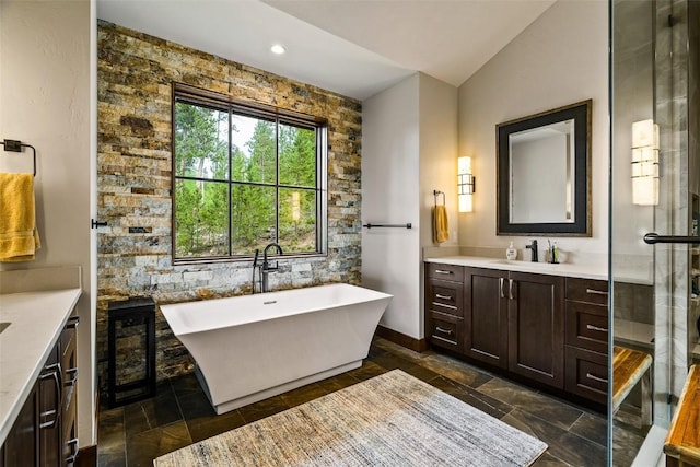 455 Highfield Trl, Breckenridge, CO 80424 - full bathroom with vanity, a soaking tub, lofted ceiling, and recessed lighting