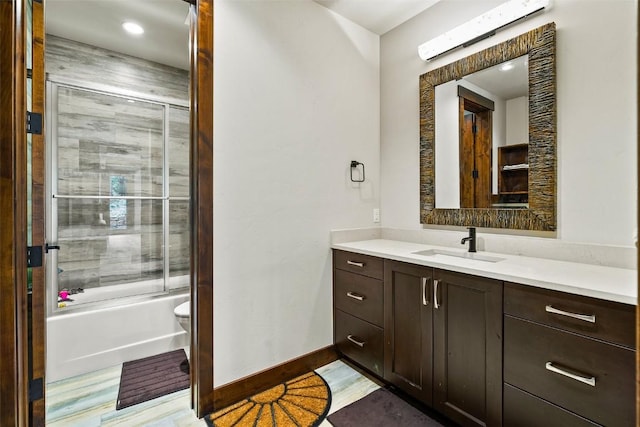 455 Highfield Trl, Breckenridge, CO 80424 - bathroom featuring vanity, enclosed tub / shower combo, and wood finished floors