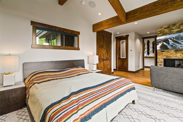 455 Highfield Trl, Breckenridge, CO 80424 - bedroom with wood finished floors, recessed lighting, and a fireplace