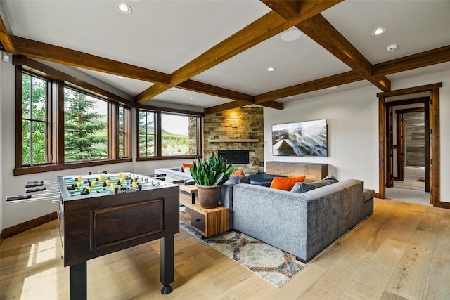 455 Highfield Trl, Breckenridge, CO 80424 - living room with beamed ceiling, light wood finished floors, a stone fireplace, recessed lighting, and coffered ceiling