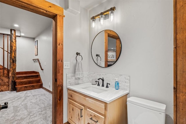 21015 Palomino Way, Oak Creek, CO 80467 - half bath with vanity, toilet, tasteful backsplash, and recessed lighting