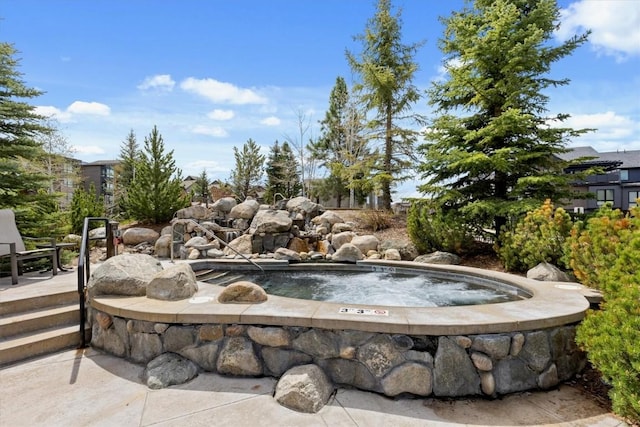 exterior space with a jacuzzi