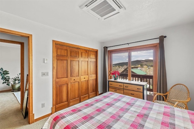 663 Amethyst Dr, Steamboat Springs, CO 80487 - carpeted bedroom featuring baseboards and a closet