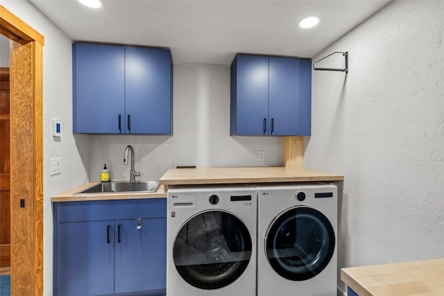663 Amethyst Dr, Steamboat Springs, CO 80487 - laundry room with cabinet space, washing machine and clothes dryer, recessed lighting, and a textured wall