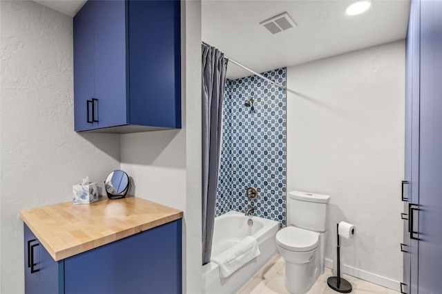 663 Amethyst Dr, Steamboat Springs, CO 80487 - full bathroom featuring shower / bath combo, toilet, and recessed lighting