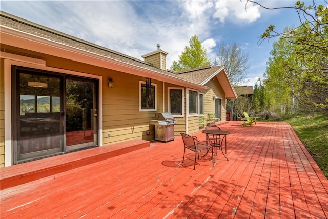 663 Amethyst Dr, Steamboat Springs, CO 80487 - wooden deck with outdoor dining area