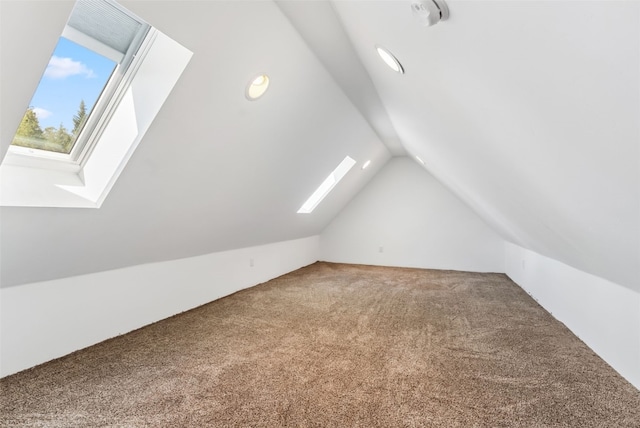 475 Vail Cir, Dillon, CO 80435 - additional living space featuring a skylight, carpet, and lofted ceiling