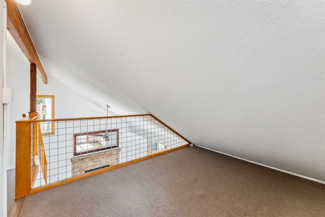 475 Vail Cir, Dillon, CO 80435 - unfurnished living room featuring lofted ceiling and carpet floors
