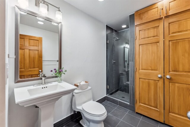 475 Vail Cir, Dillon, CO 80435 - bathroom featuring tile patterned flooring, a stall shower, toilet, recessed lighting, and baseboards