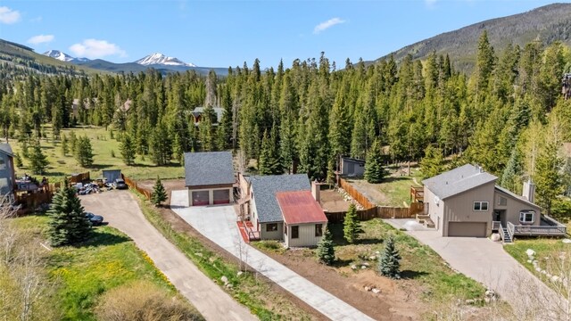 475 Vail Cir, Dillon, CO 80435 - view from above of property with a forest and a mountain backdrop