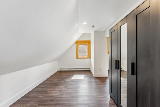 475 Vail Cir, Dillon, CO 80435 - bonus room featuring a baseboard radiator, baseboards, vaulted ceiling, dark wood-type flooring, and recessed lighting