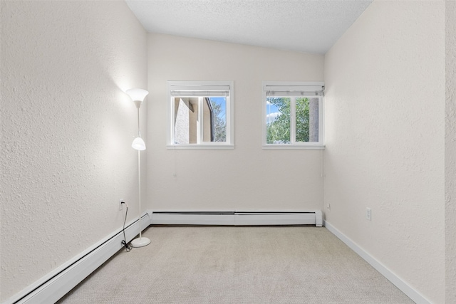 921 Fairview Blvd Unit 14, Breckenridge, CO 80424 - carpeted empty room with a textured wall and a baseboard heating unit