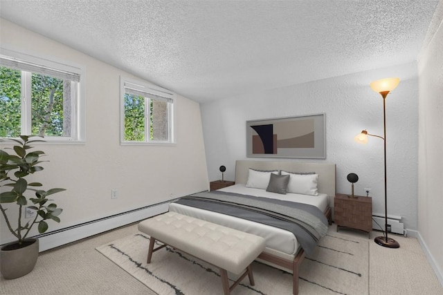 921 Fairview Blvd Unit 14, Breckenridge, CO 80424 - bedroom featuring a textured ceiling, a baseboard radiator, carpet floors, and vaulted ceiling