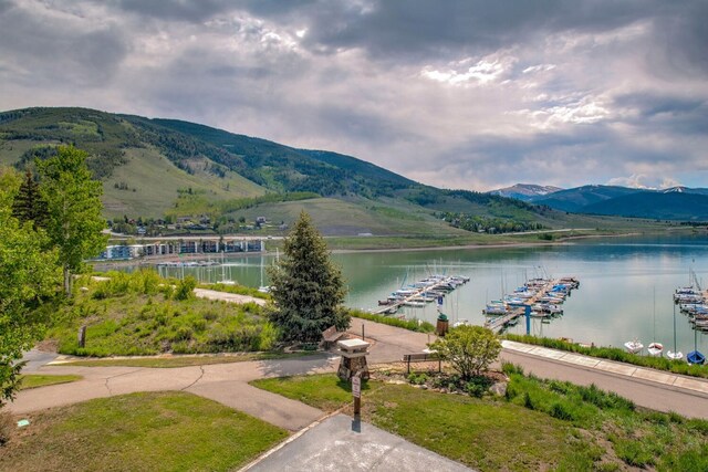 188 E Ln Bonte St Unit 327, Dillon, CO 80435 - water view with a mountainous background and a boat dock