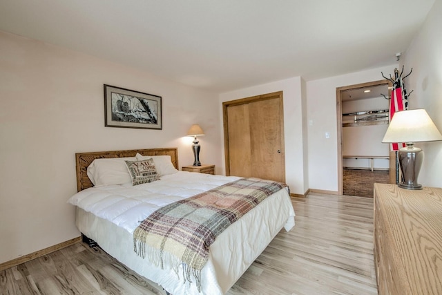 188 E Ln Bonte St Unit 327, Dillon, CO 80435 - bedroom featuring wood finished floors and a closet