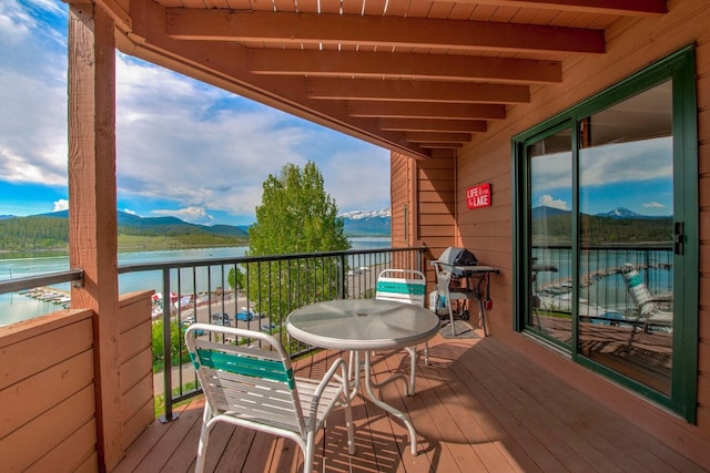 188 E Ln Bonte St Unit 327, Dillon, CO 80435 - balcony featuring a water and mountain view and area for grilling