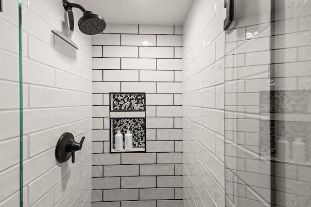 bathroom view of tiled shower