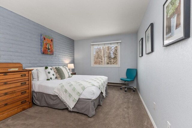 3 Cedar Ct Unit 3, Steamboat Springs, CO 80487 - bedroom featuring carpet, baseboards, and baseboard heating