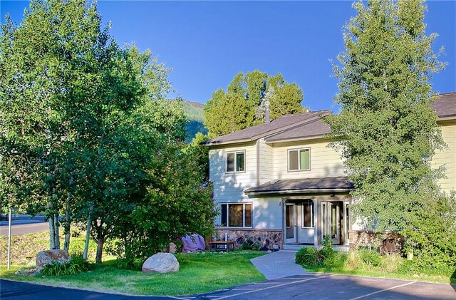 3 Cedar Ct Unit 3, Steamboat Springs, CO 80487 - view of front of house featuring a front yard and uncovered parking