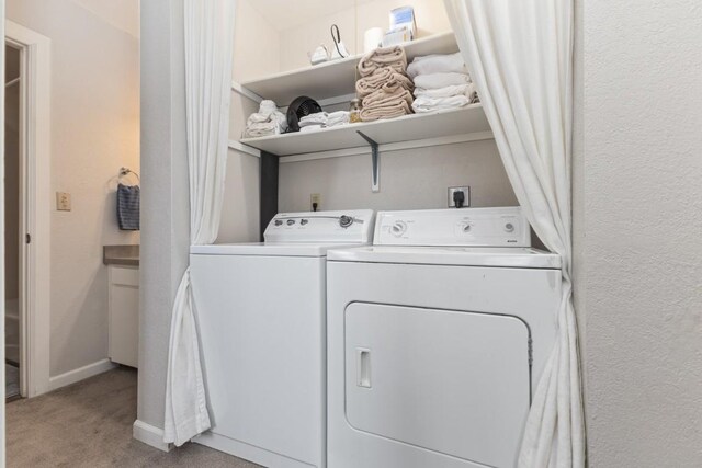 3 Cedar Ct Unit 3, Steamboat Springs, CO 80487 - washroom with washing machine and clothes dryer, carpet floors, and baseboards