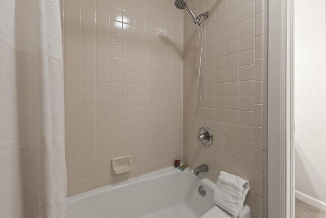 3 Cedar Ct Unit 3, Steamboat Springs, CO 80487 - full bathroom featuring shower / bath combo and baseboards