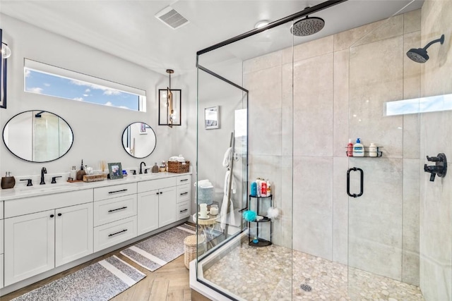 23430 Postrider Trl, Oak Creek, CO 80467 - bathroom featuring a stall shower and double vanity