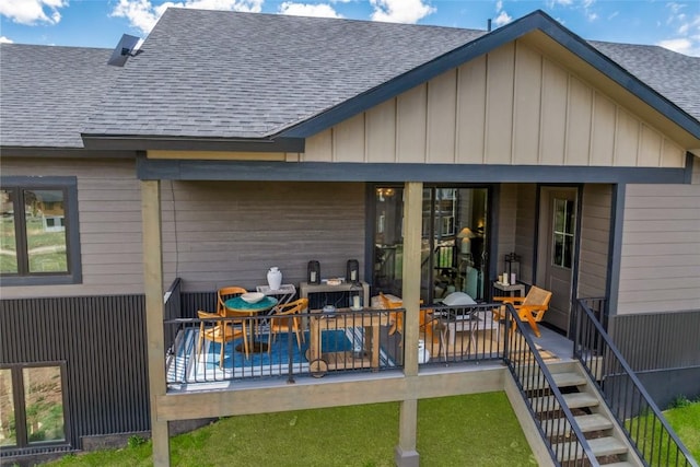 23430 Postrider Trl, Oak Creek, CO 80467 - back of house featuring roof with shingles