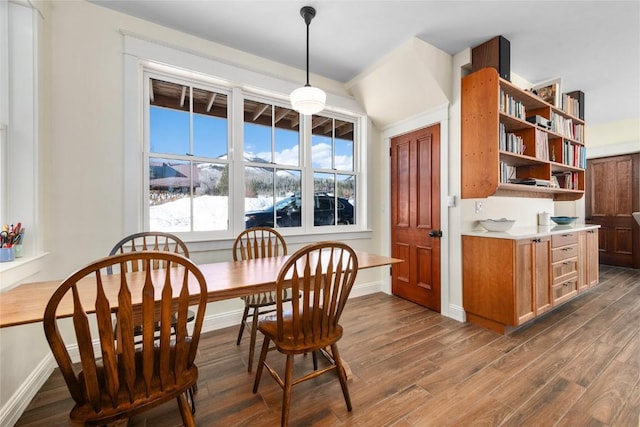 25640 6th Ave, Hahns Peak, CO 80428 - dining area featuring baseboards and dark wood-type flooring