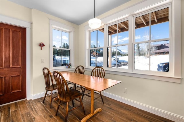 25640 6th Ave, Hahns Peak, CO 80428 - dining area featuring baseboards and dark wood-style flooring
