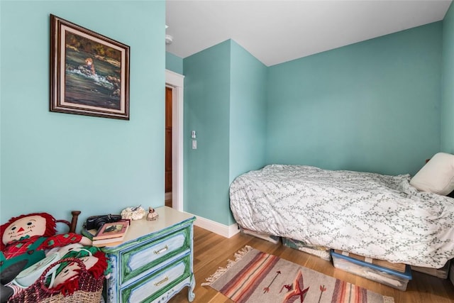 25640 6th Ave, Hahns Peak, CO 80428 - interior space with wood finished floors, a ceiling fan, and baseboards
