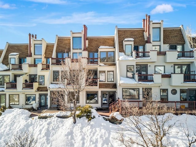 view of snow covered property